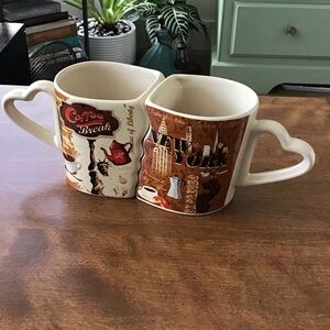 Set of two interlocking New York "puzzle mugs"